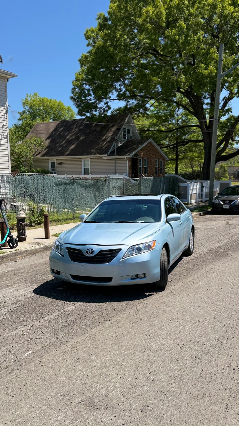 Blue Toyota Camry xse
