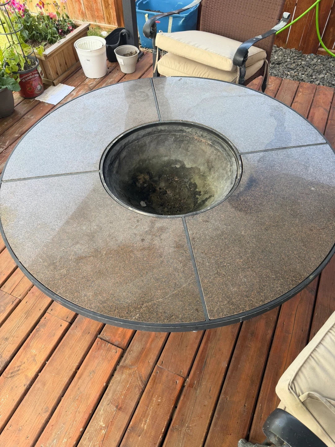 Round fire table and Brown Wicker Patio Chairs