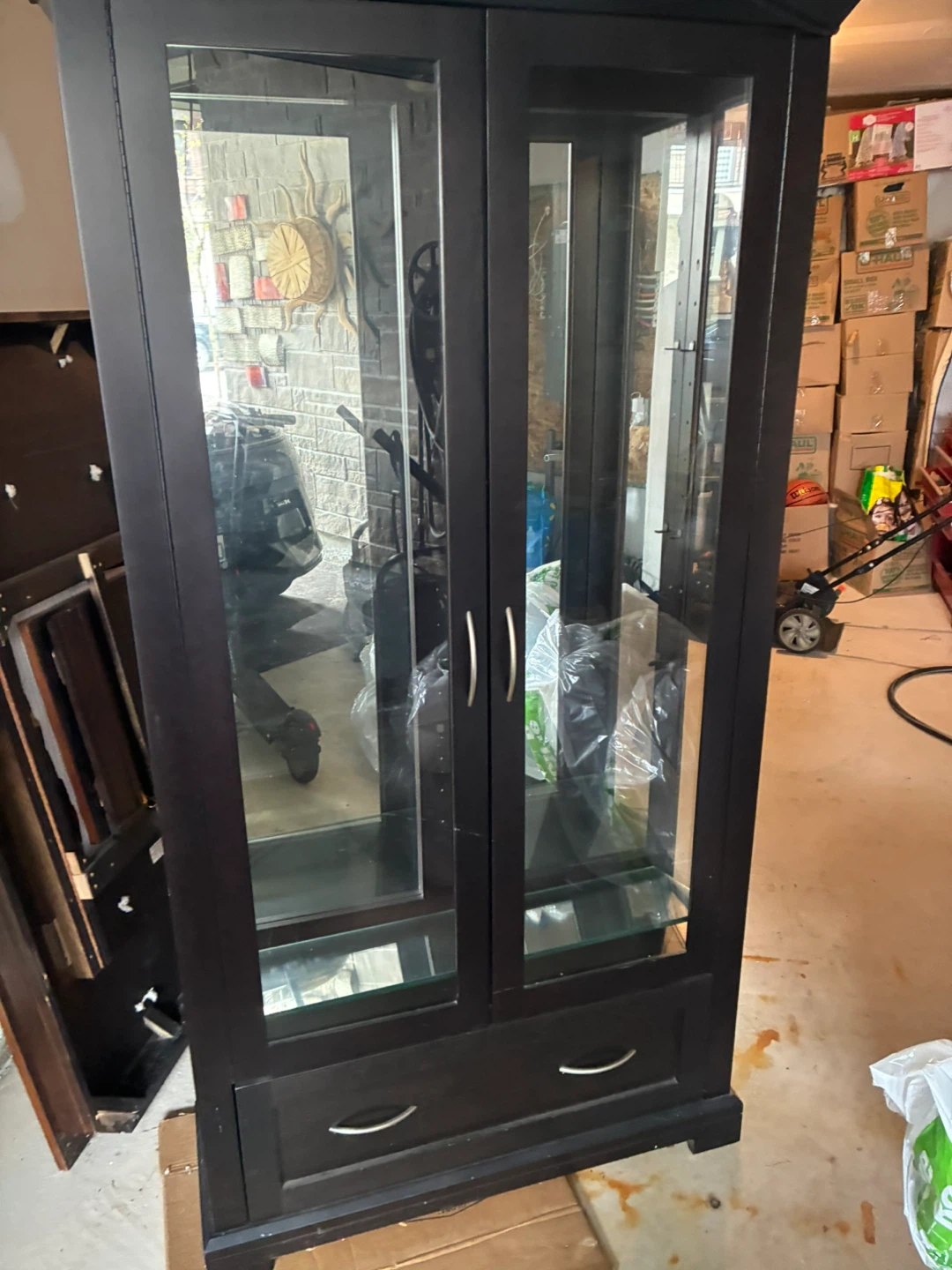(Hutch) glass cabinet with a light  inside and glass shelves