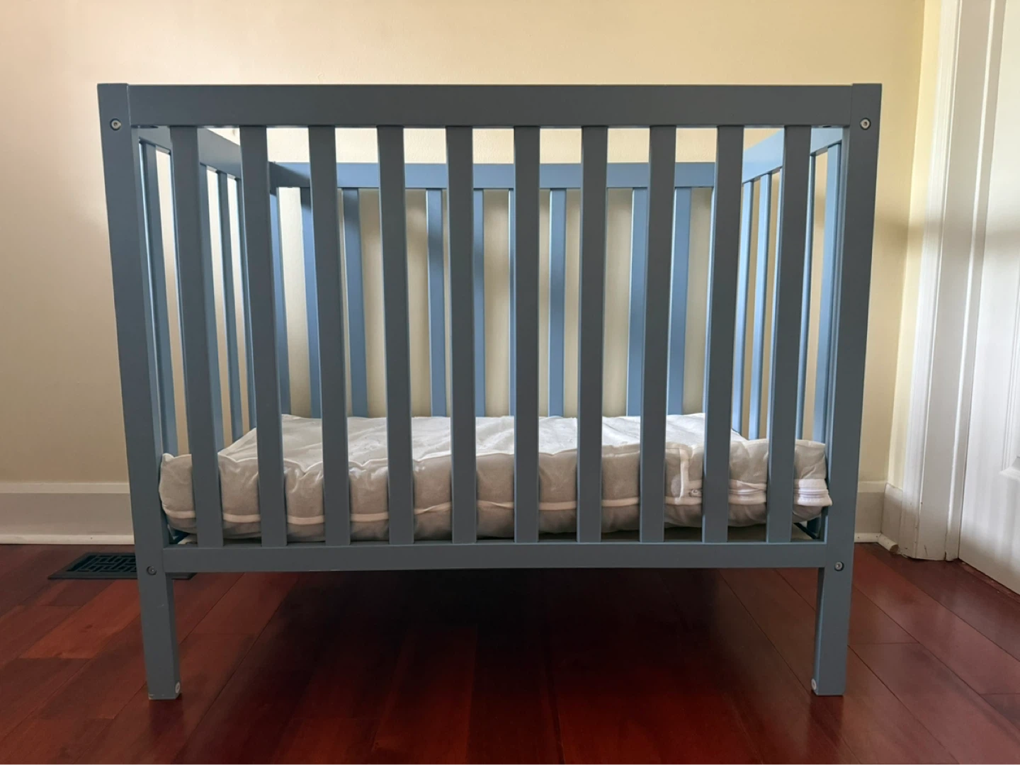 4-in-1 Convertible Mini Crib and Mattress for Sale