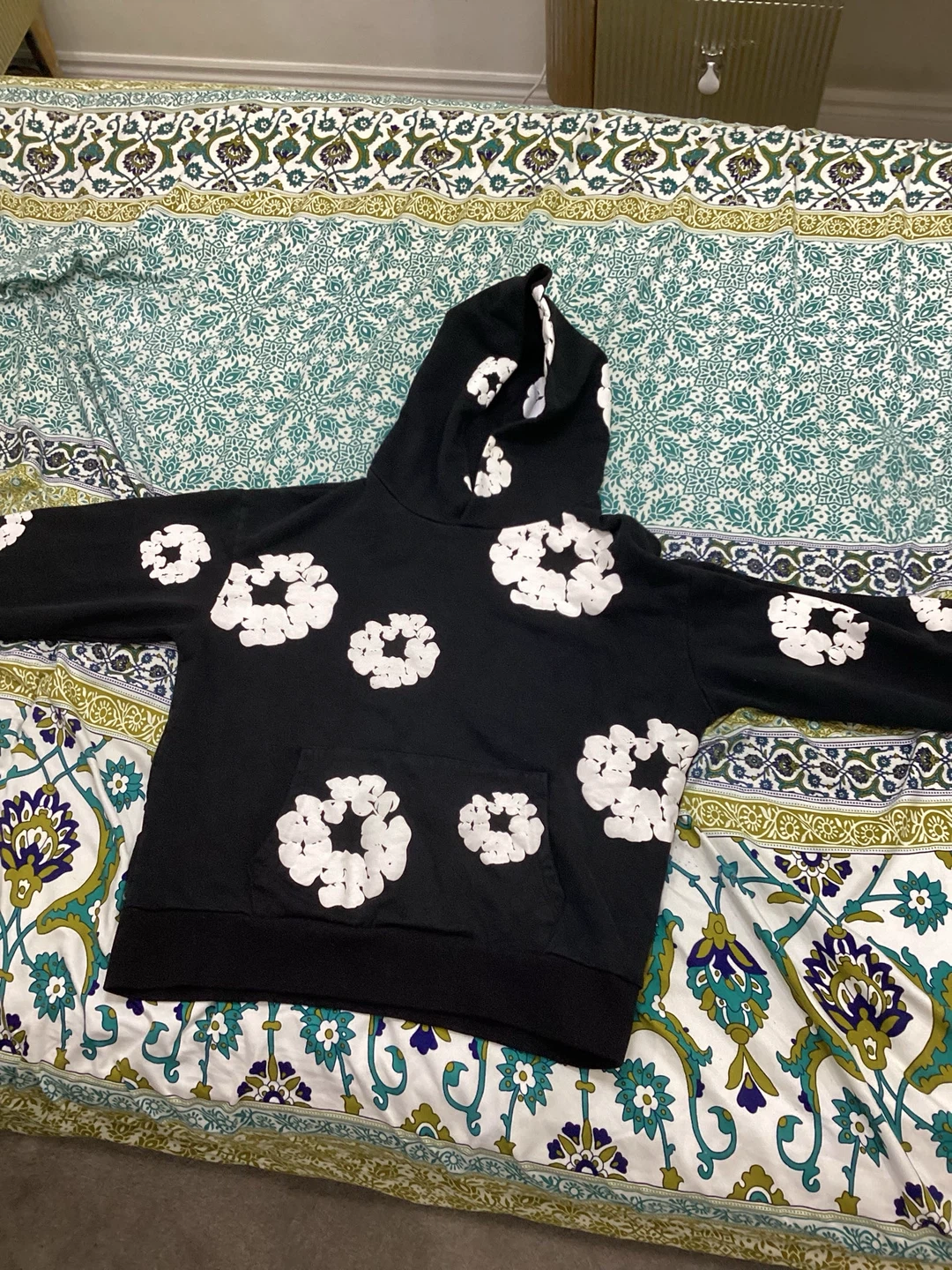 Denim Tears Black Hoodie with White Flower Print