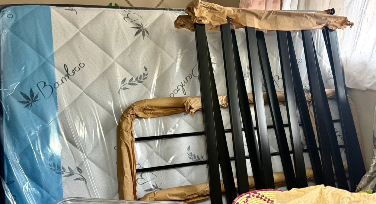 Brand new double mattress, with bed frame and mattress protector
