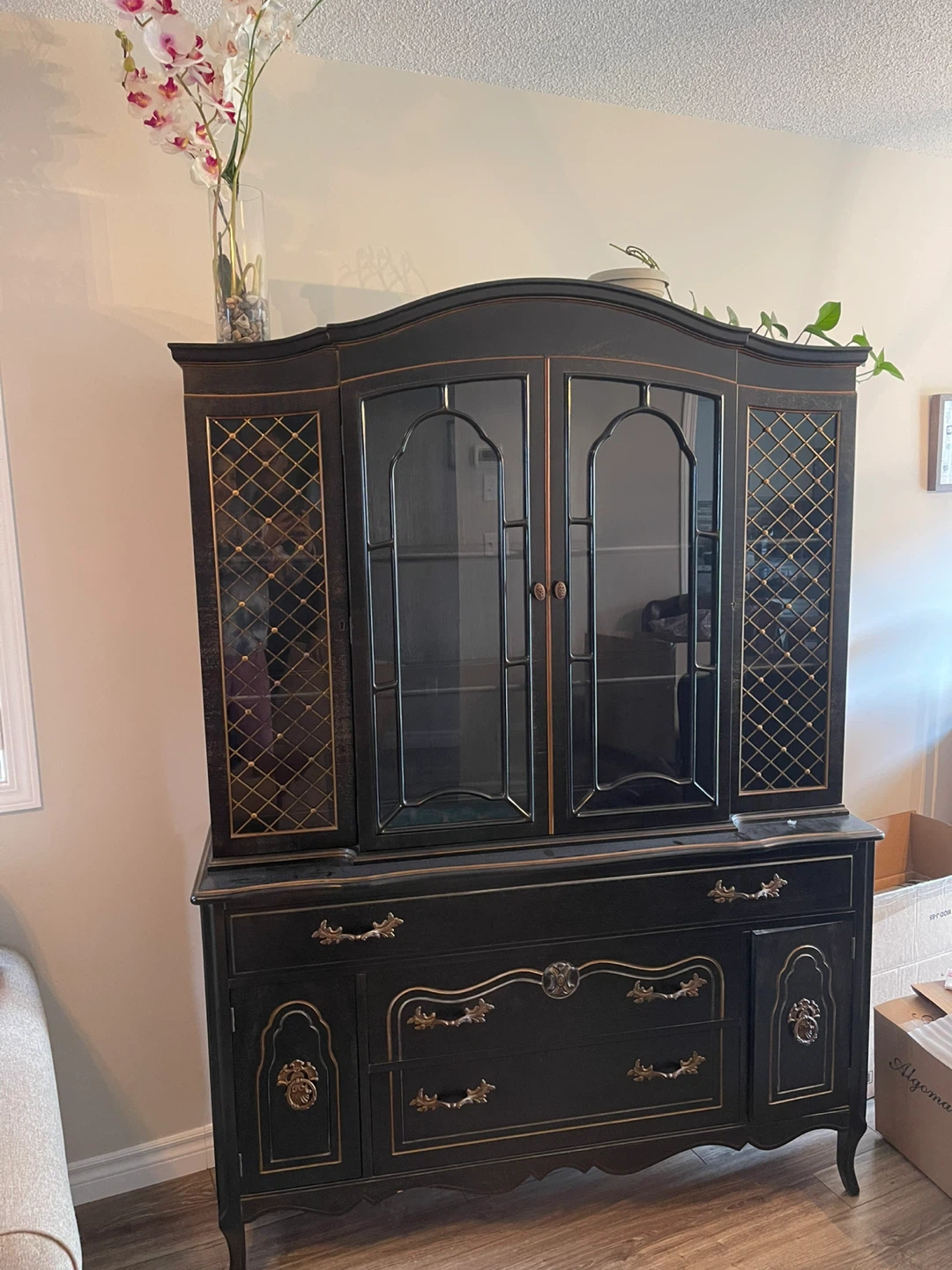 Black Cabinet with Gold Trim