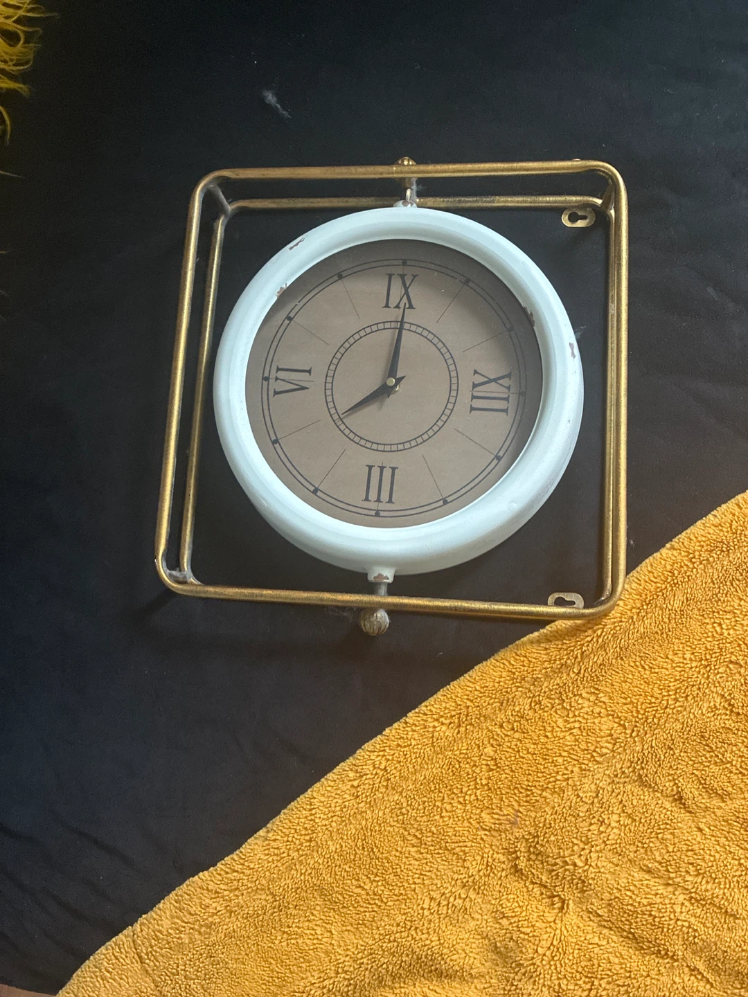 Gold and White Wall Clock with Roman Numerals
