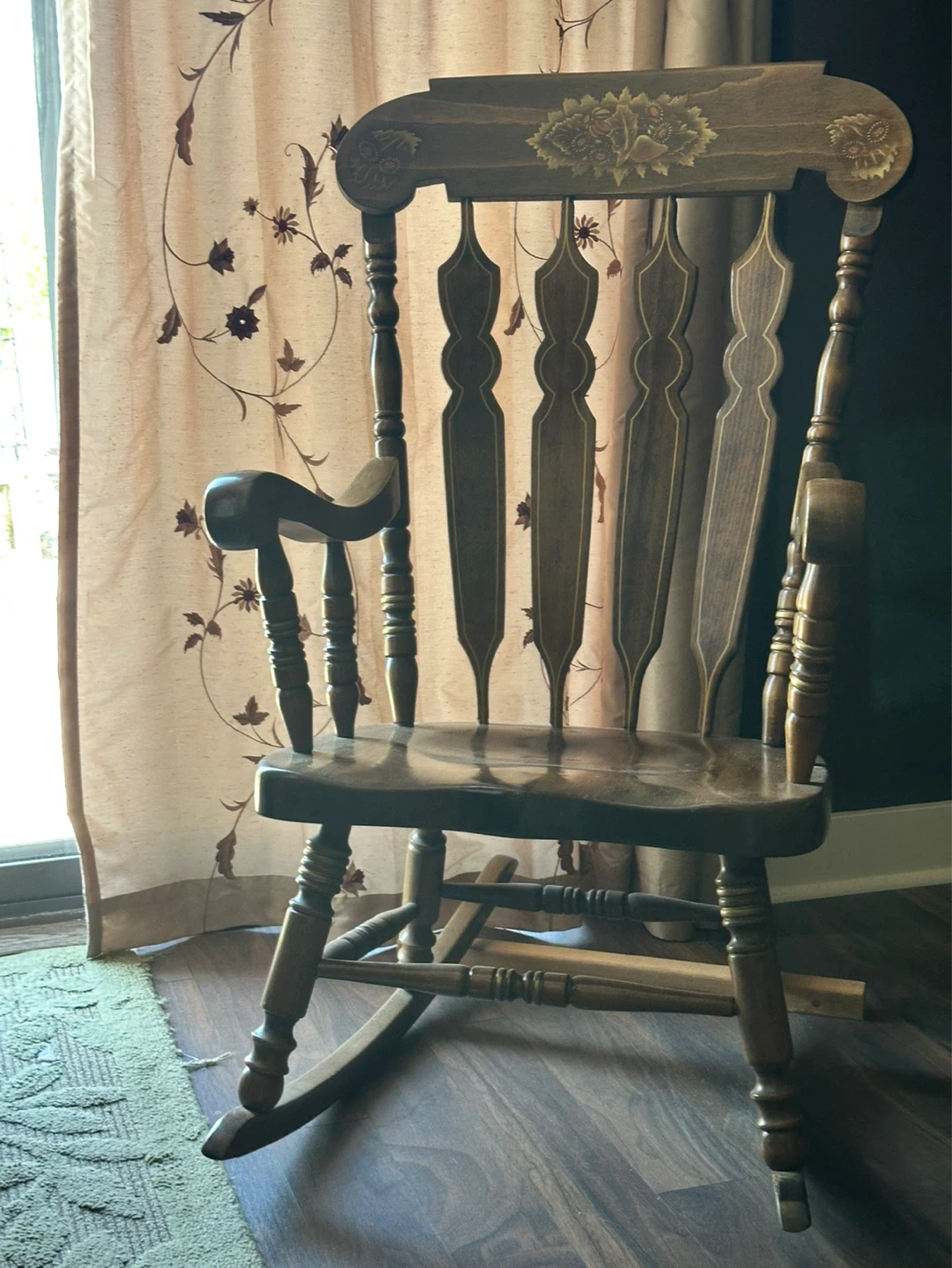 Wooden Rocking Chair with Ornate Back
