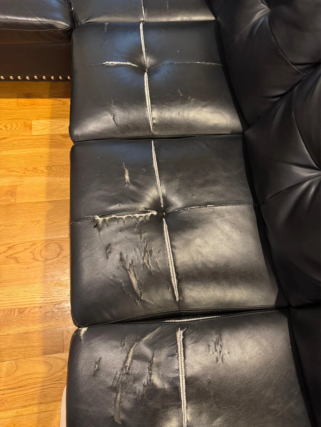 Black Faux Leather Sectional Sofa with Damage - photo 3