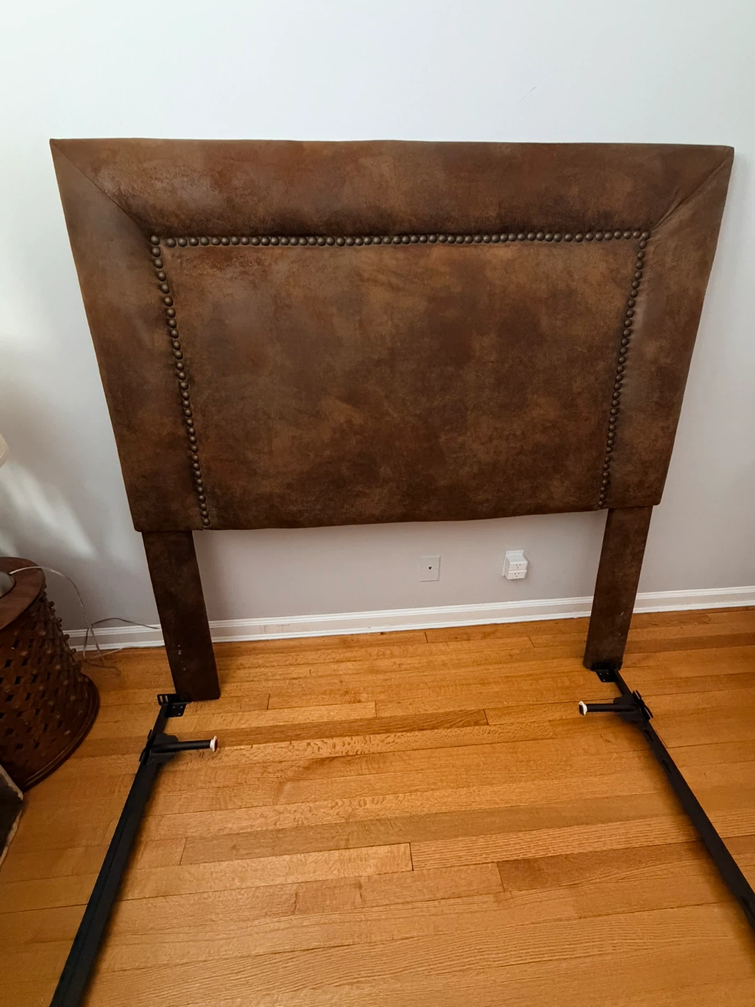 Brown Upholstered Headboard with Nailhead Trim