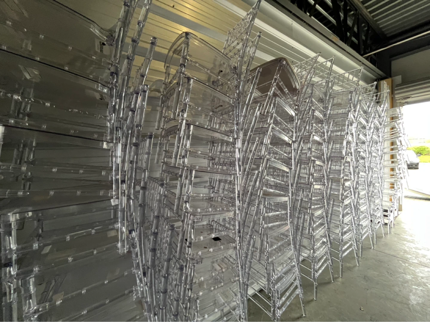 Stacking Clear Ghost Chairs and Folding Tables - photo 2