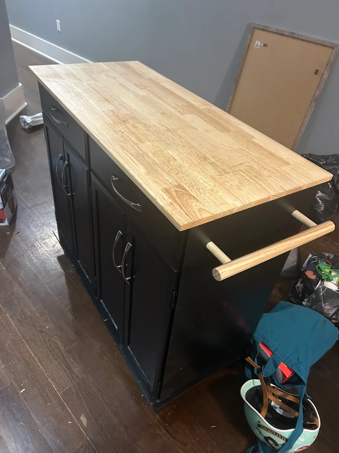 Black Kitchen Island with Wood Top and Towel Rack
