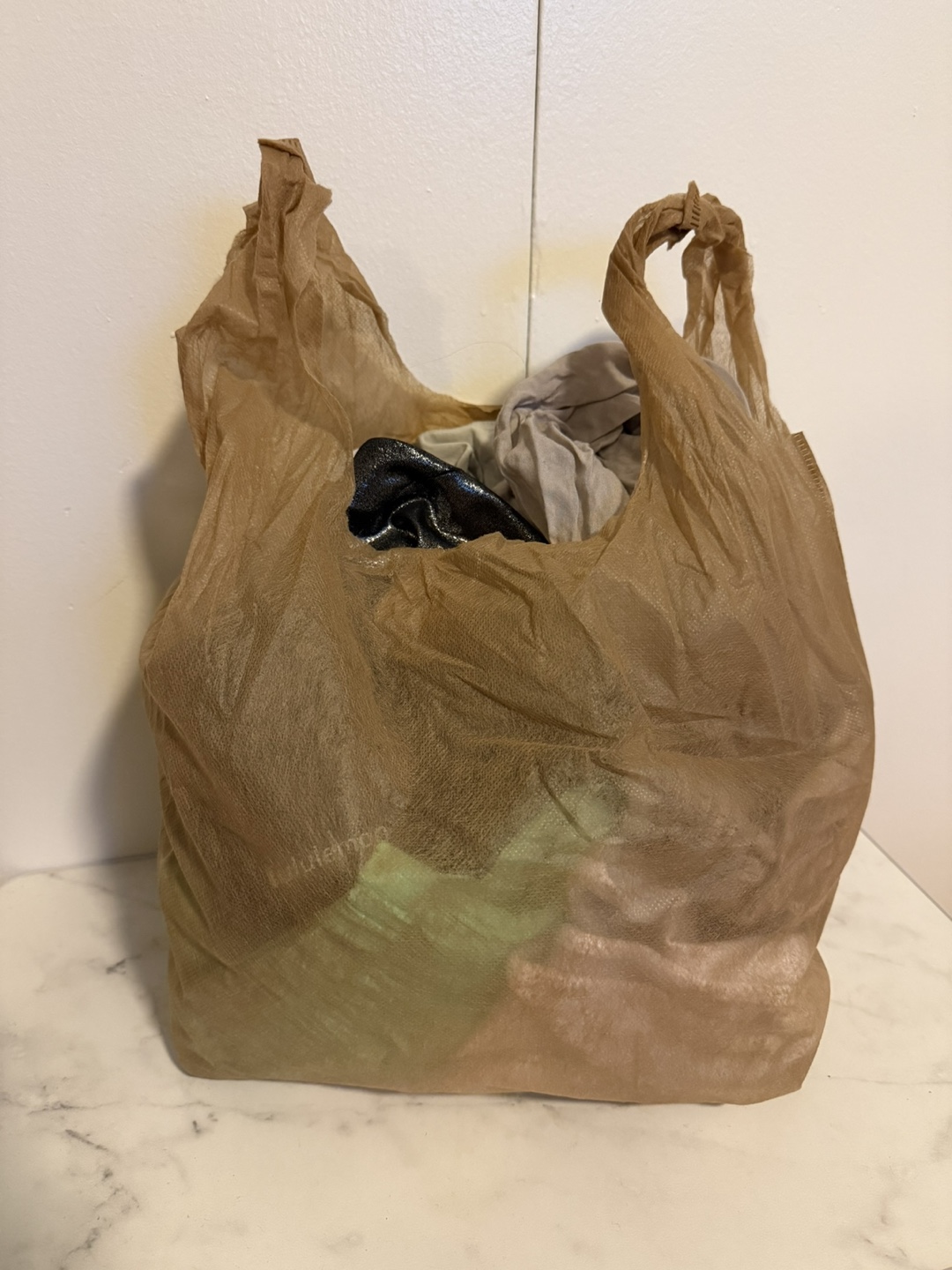 Bag of Lululemon/Zara\TNA Clothes