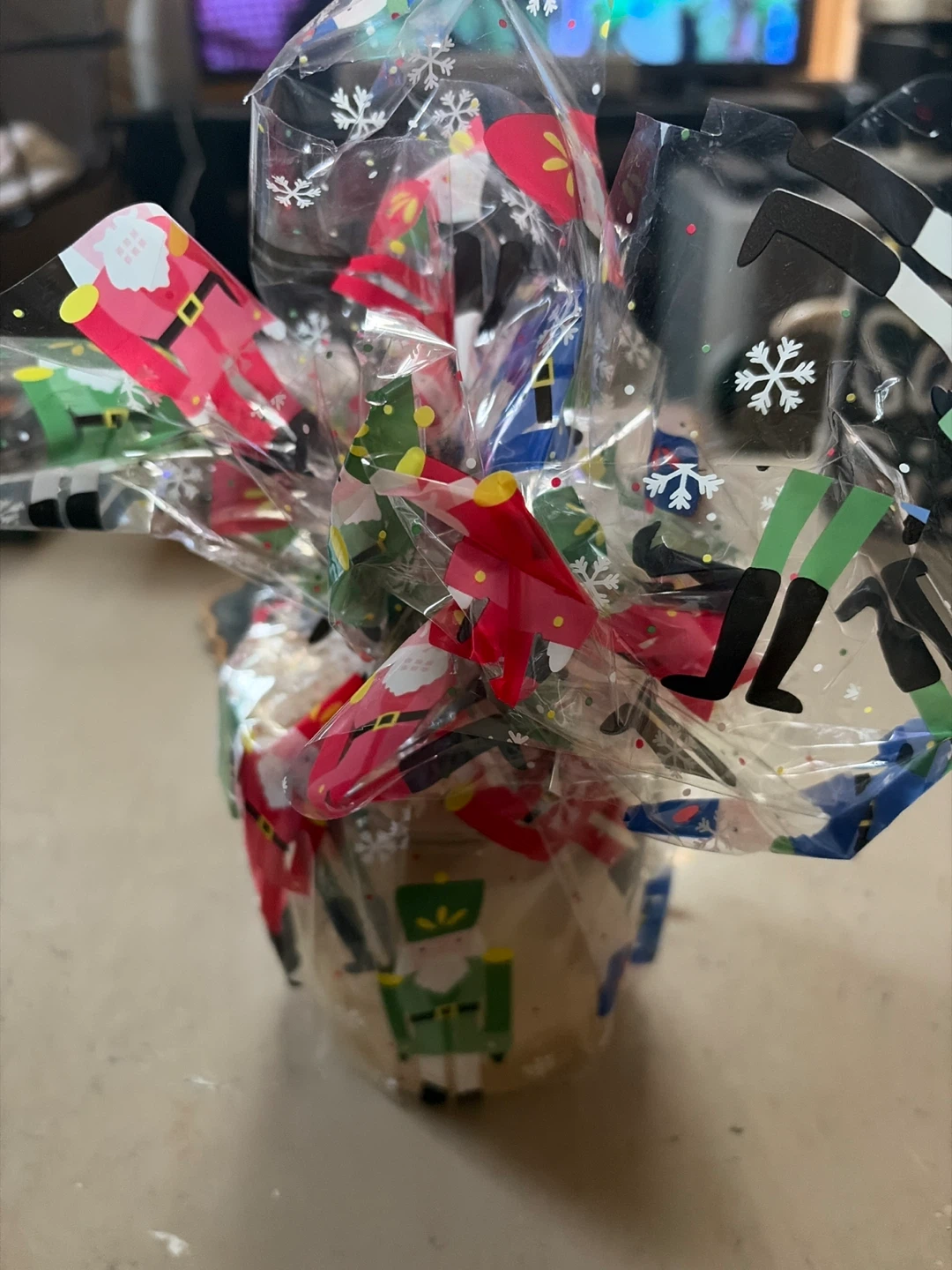 Christmas candle with nutcracker and Santa wrap