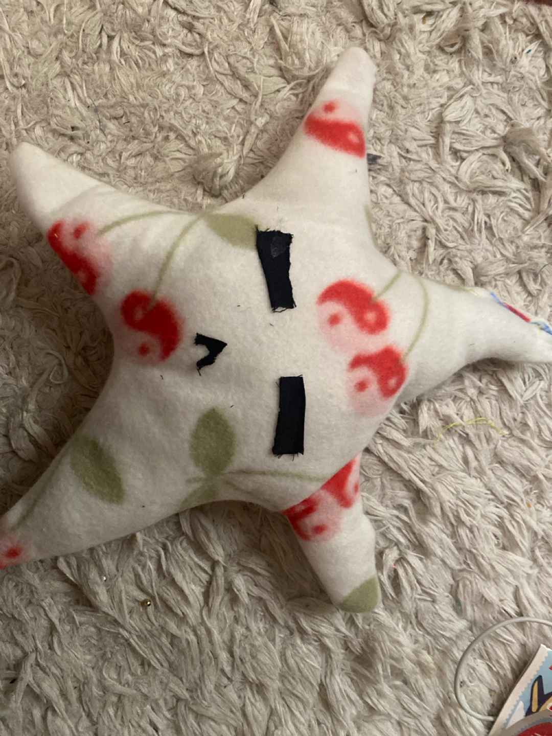 Handmade star plush with cherry pattern