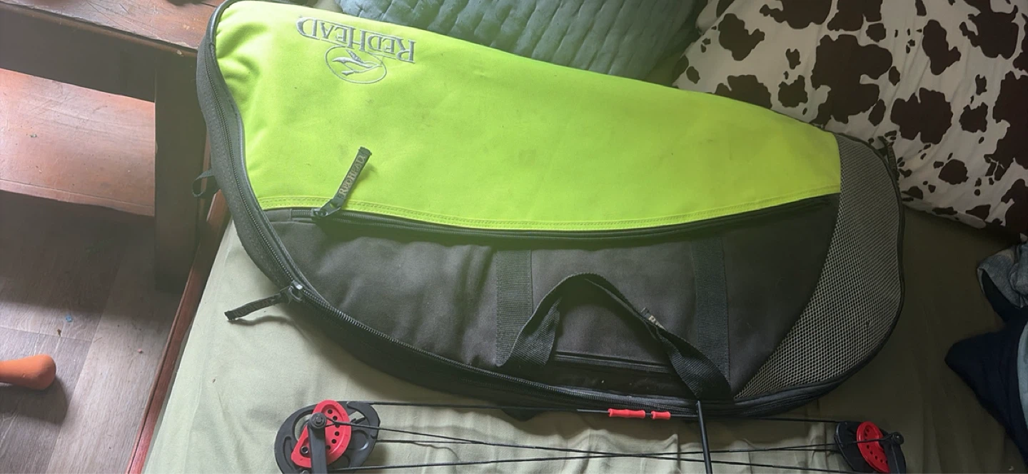 Redhead Compound Bow with Case and Arrows