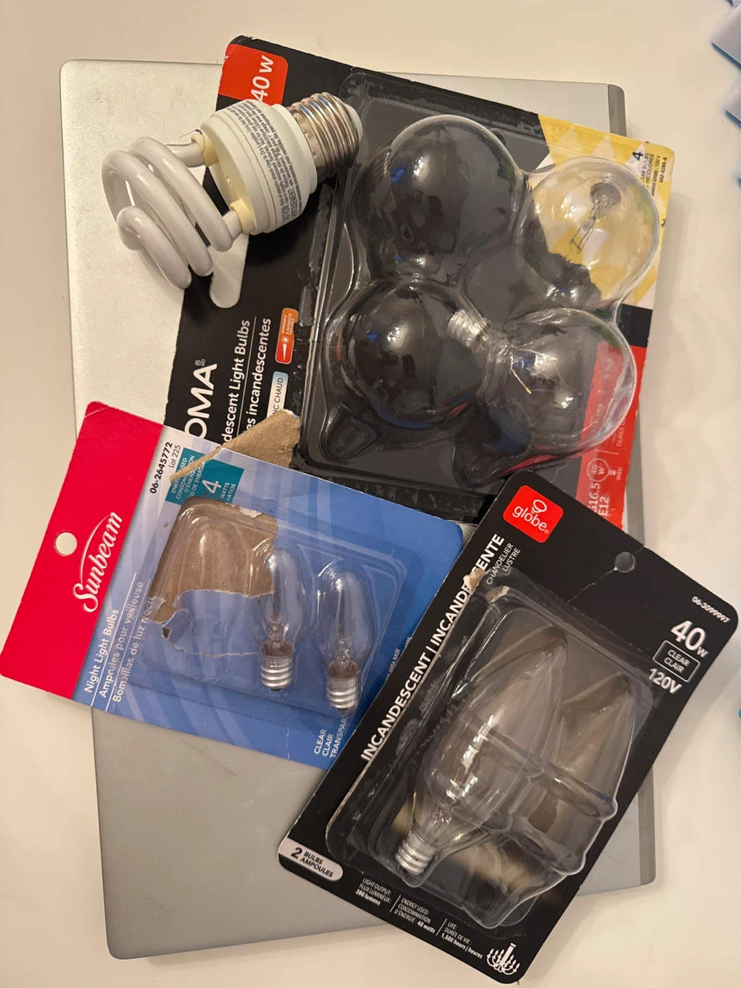 Assorted Light Bulbs: Globe, Sunbeam, and 40W Incandescent