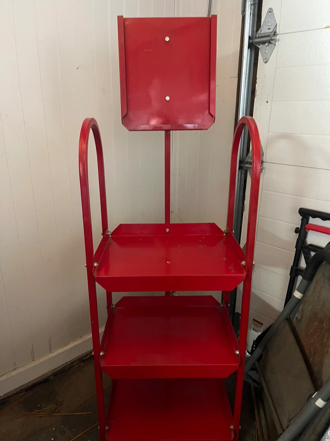 Vintage Red Metal Utility newspaper display stand with 3 Shelves