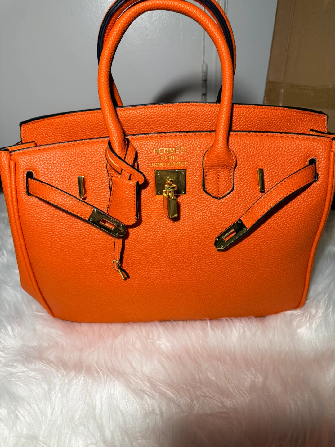Orange Pebble Grain Handbag