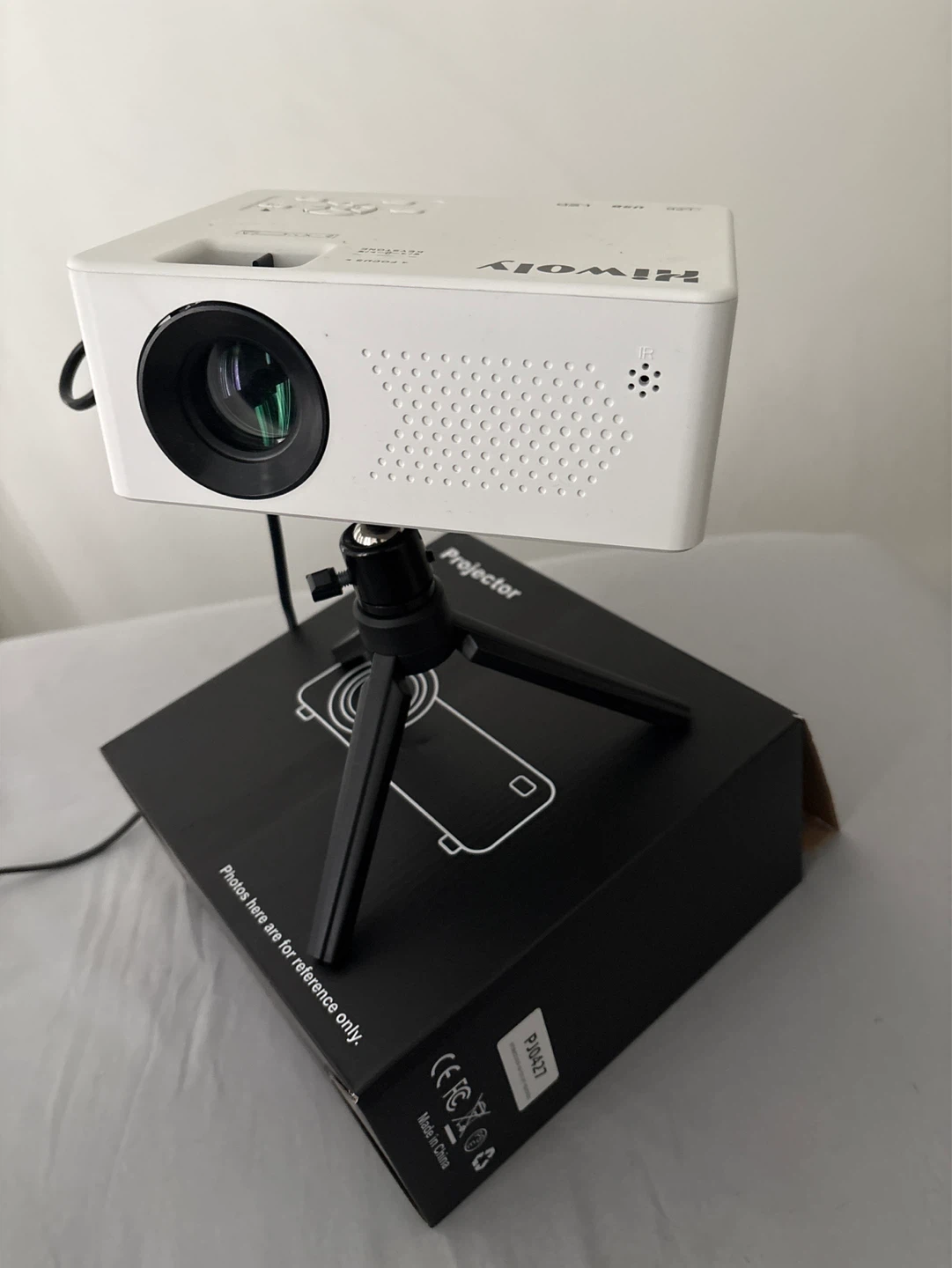 Hiwoly Mini Portable Projector with Tripod
