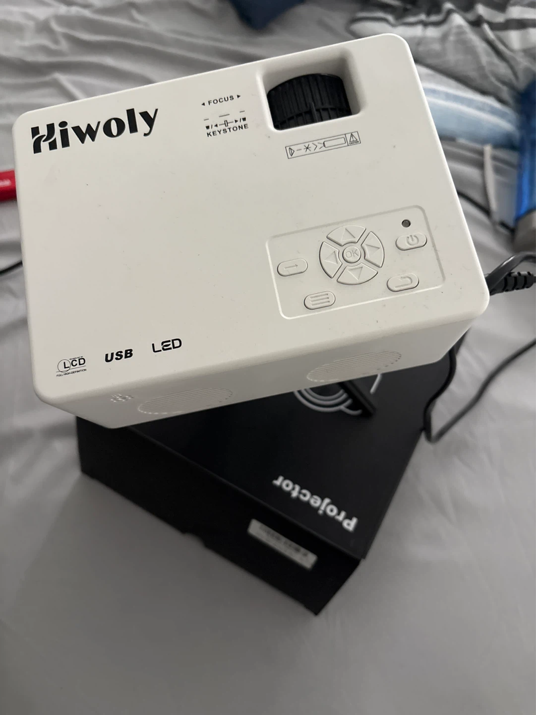 Hiwoly Mini Portable Projector with Tripod - photo 4