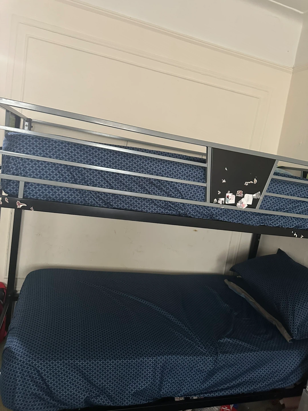Black Metal Twin Bunk Bed with Blue Bedding