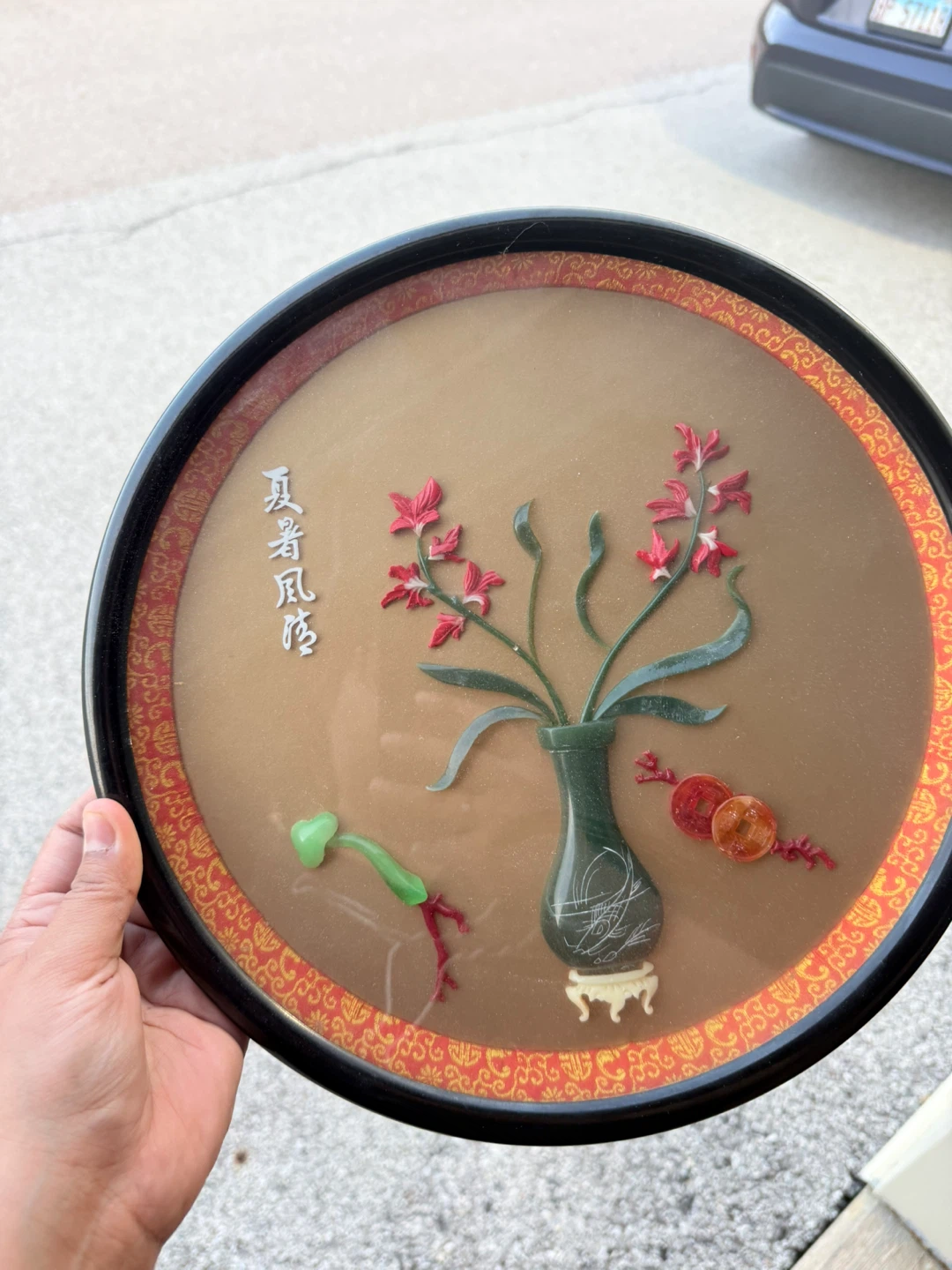 Round Decorative Wall Art with Floral Vase Design