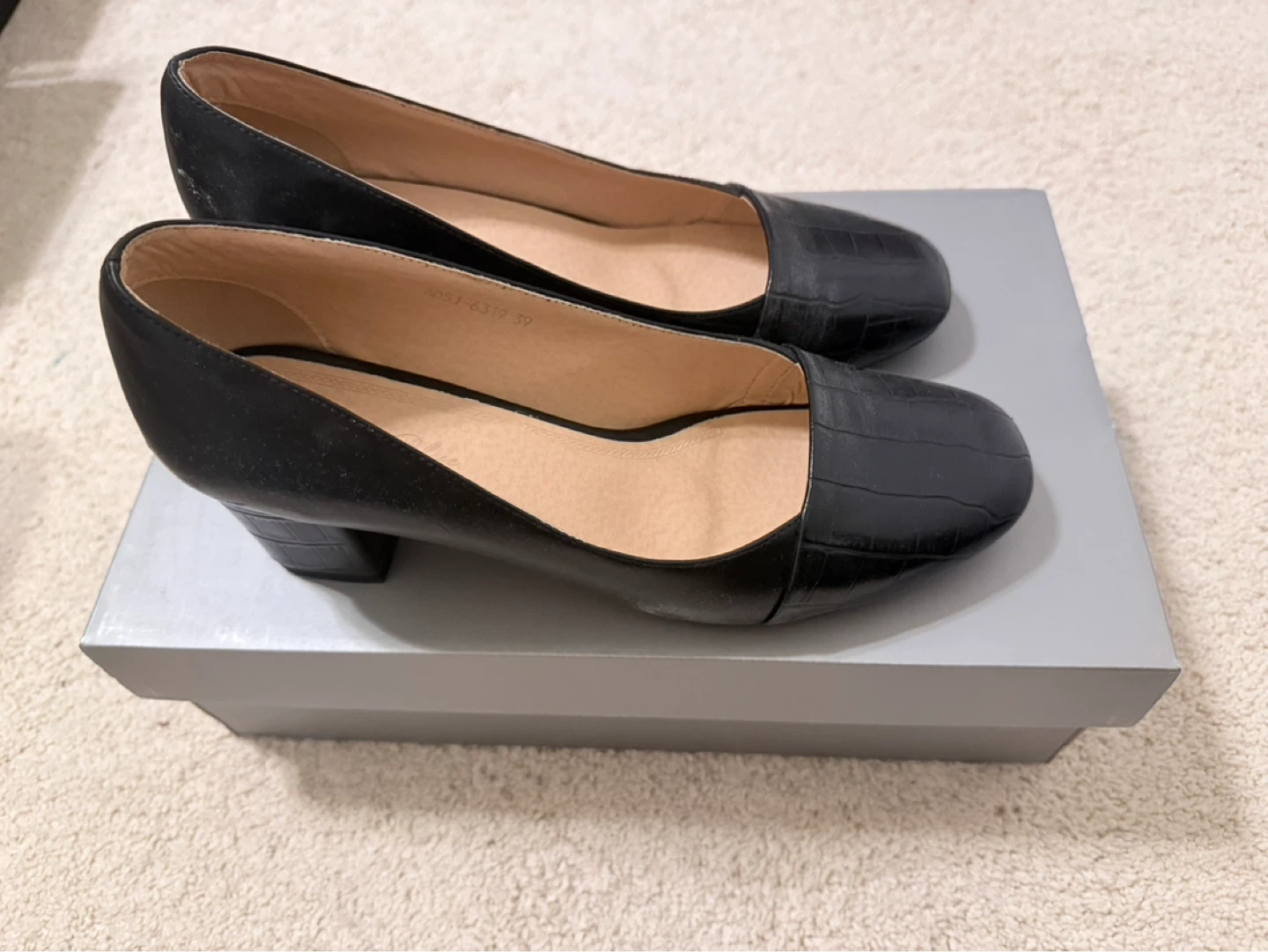 Black block heel pumps