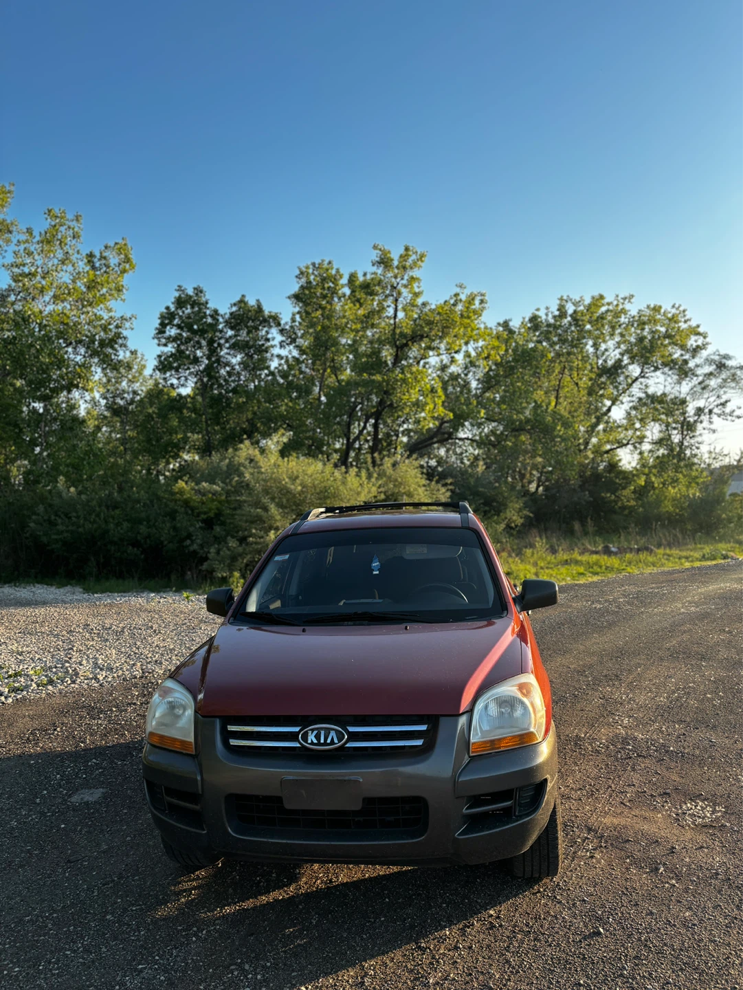 Red Kia Sportage EX 4WD SUV