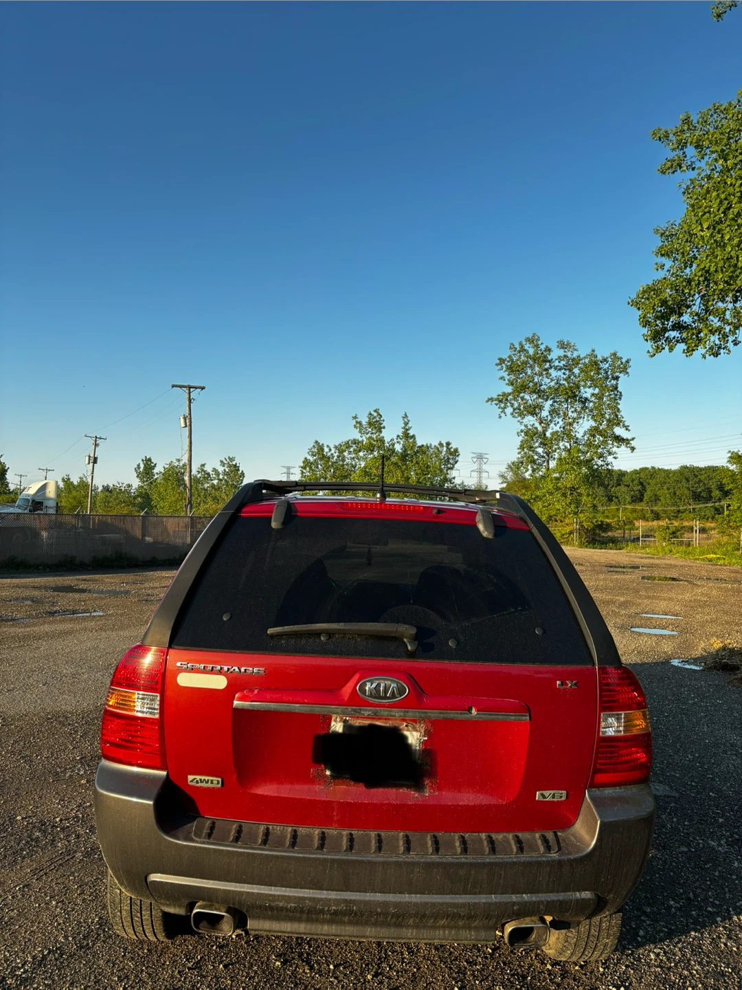 Red Kia Sportage EX 4WD SUV - photo 3