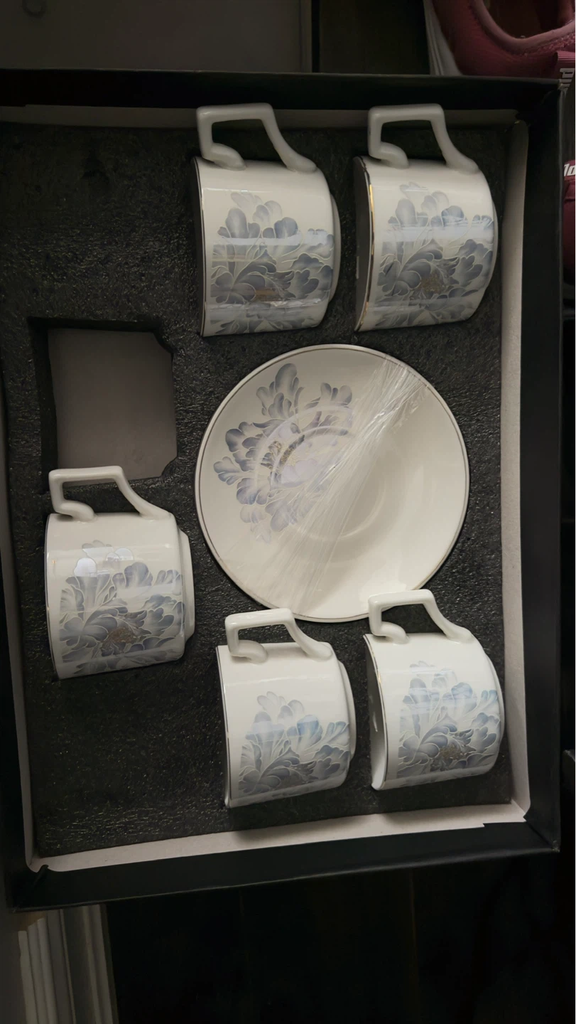 Set of Coffee Cups and Saucers with Floral Design