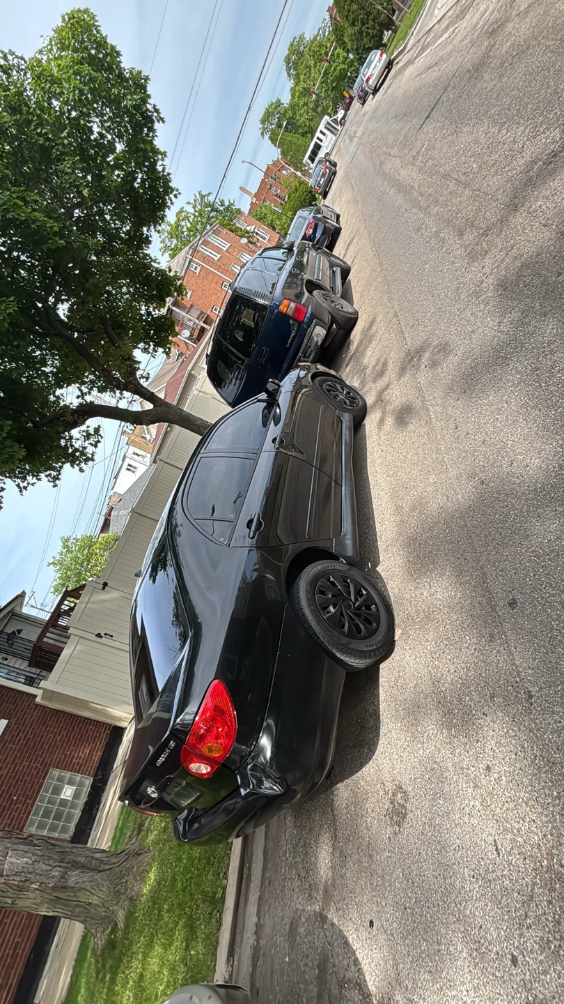 Black Toyota Corolla - photo 2