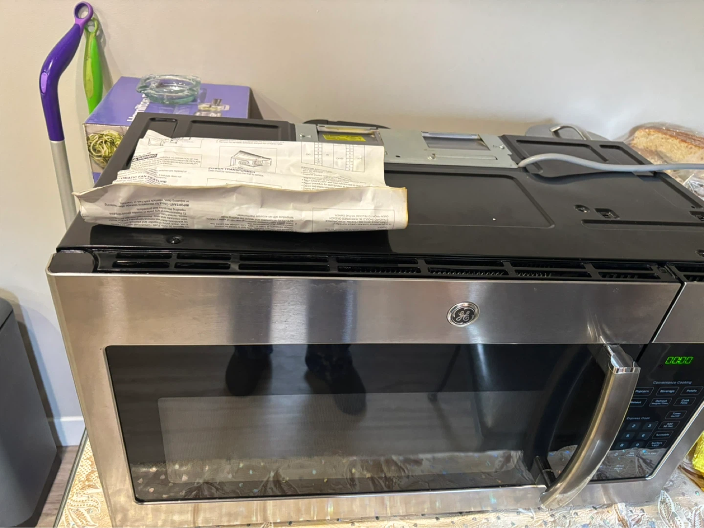 GE Stainless Steel Over-the-Range Microwave - photo 3