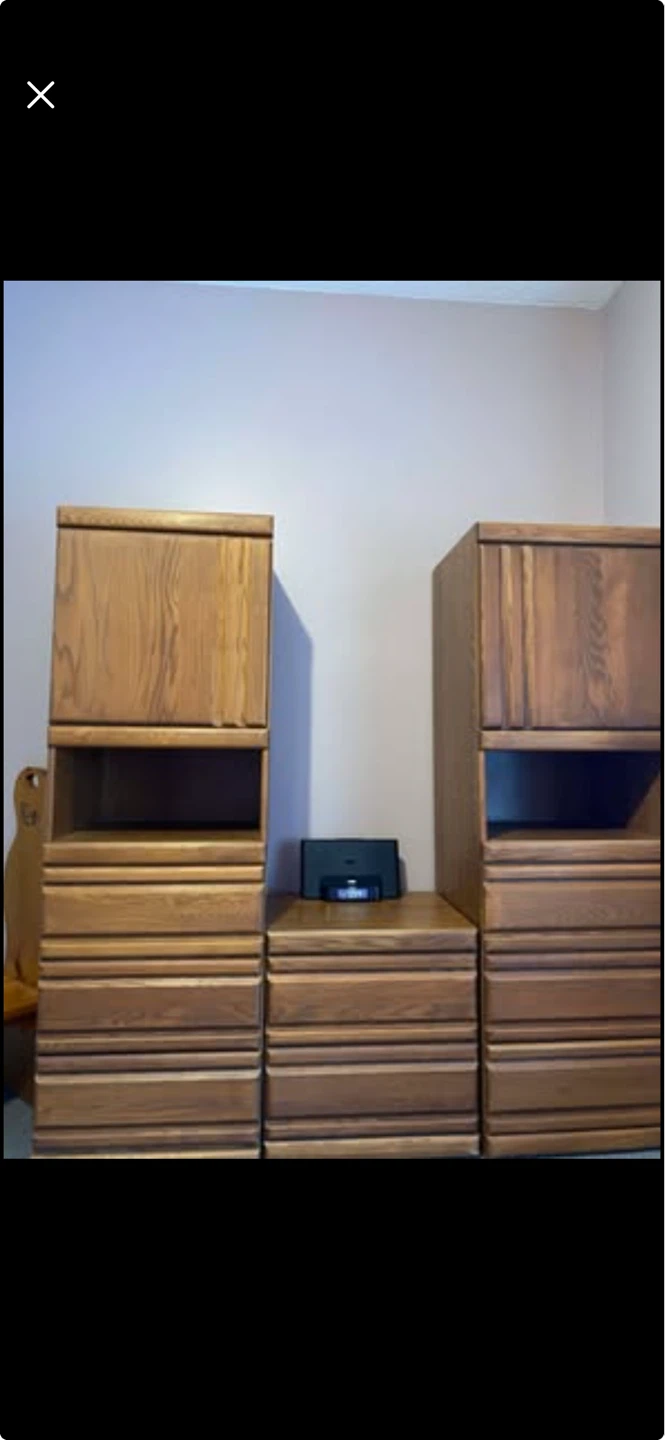 Two wooden cabinets and a nightstand/side table