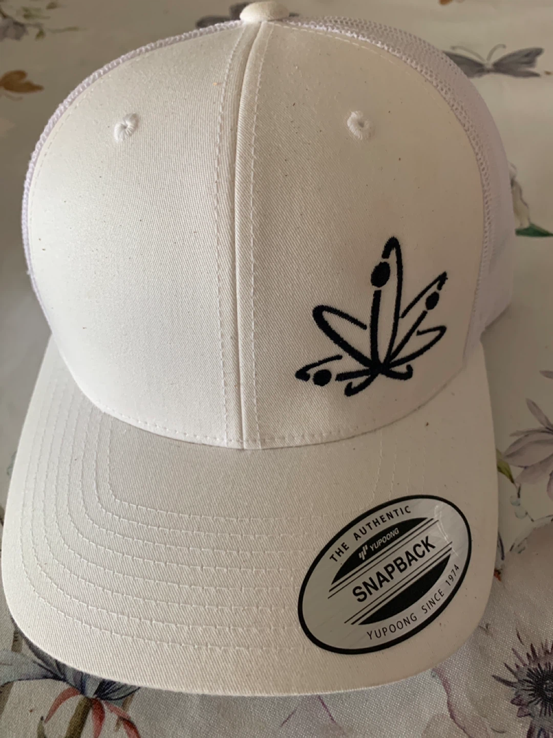 White Yupoong Snapback Hat with Black Logo