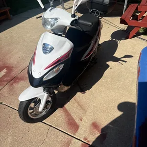 White and Black Scooter with Top Case