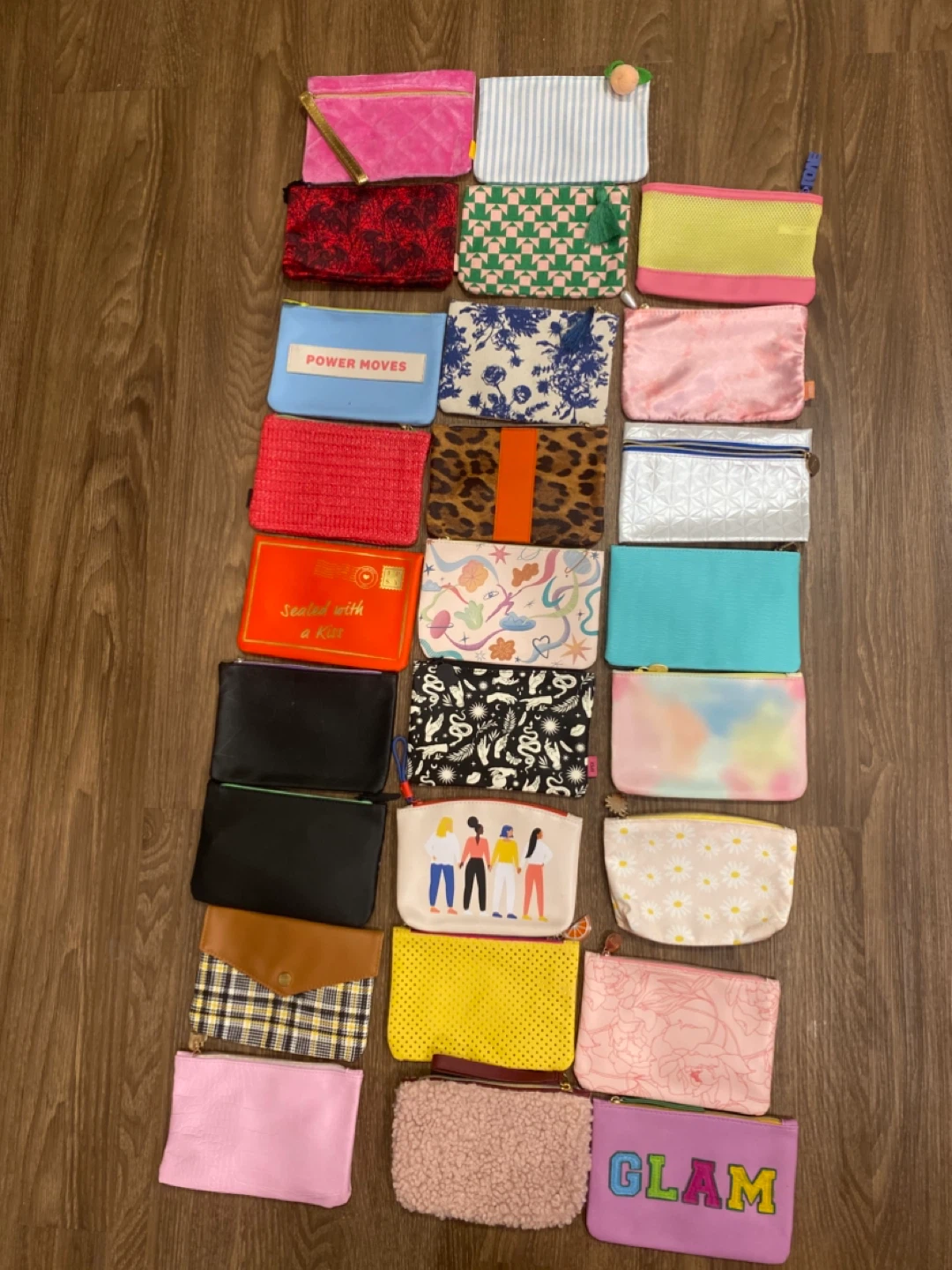 Assorted IPSY makeup bags.