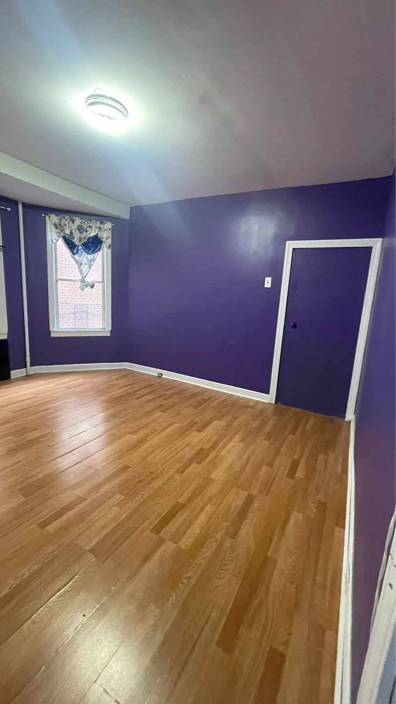 Empty Room with Hardwood Floors - photo 2