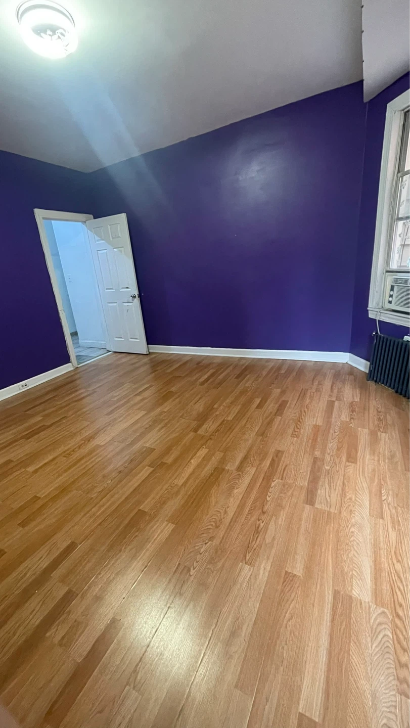 Empty Room with Hardwood Floors - photo 4