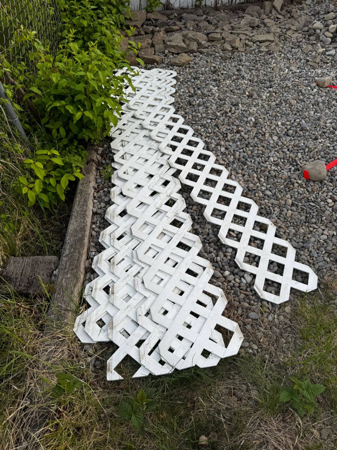 White Lattice Panels and Concrete Edging
