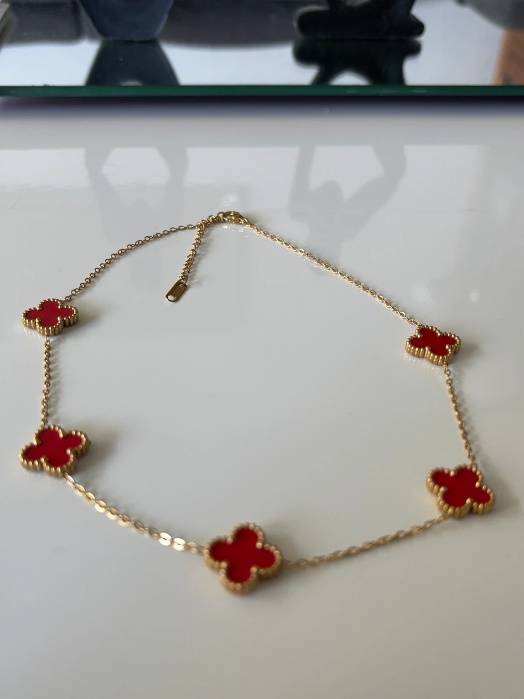 Gold plated -tone necklace with red clover charms - photo 2