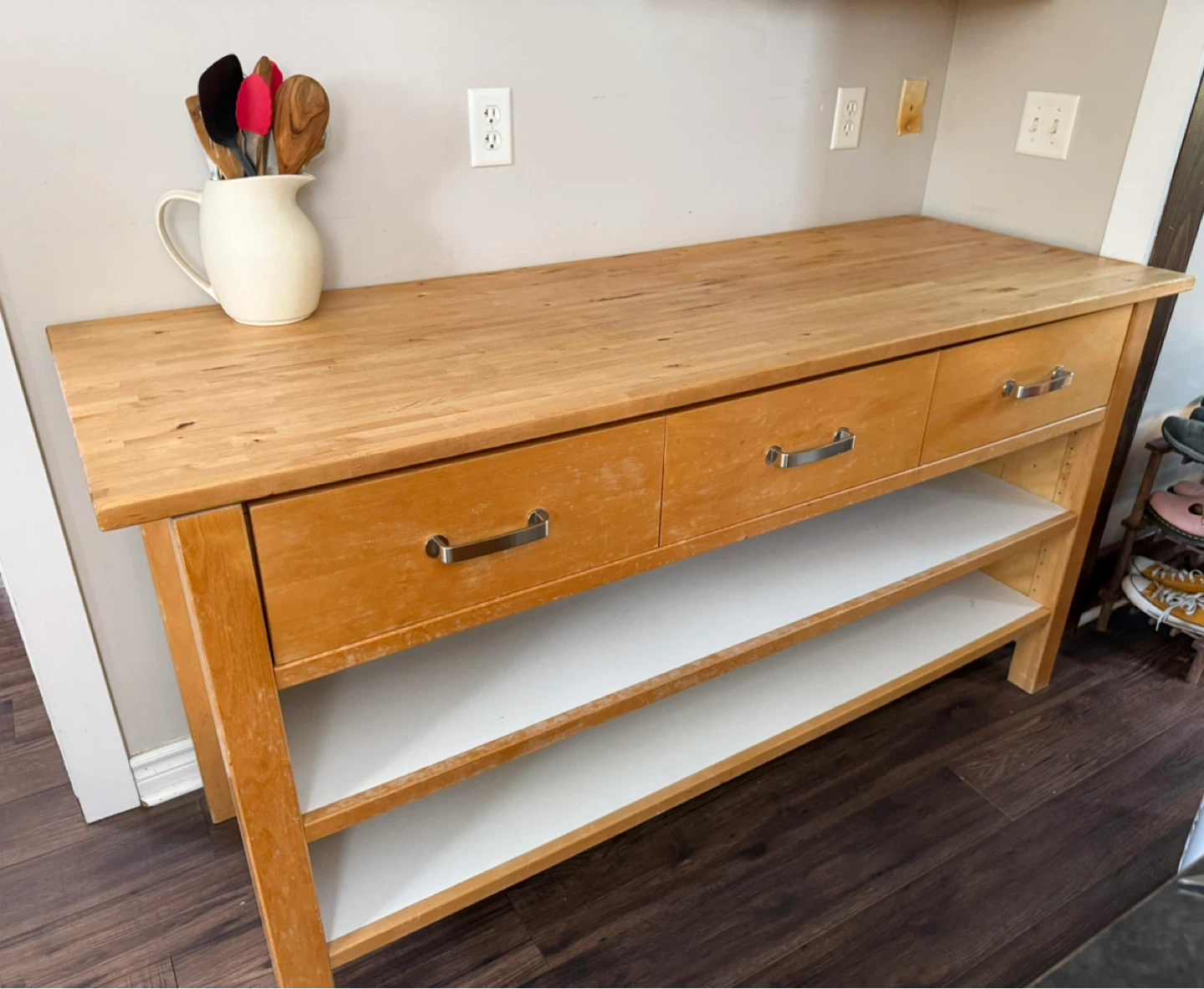 Wooden kitchen island/counter with drawers and shelves