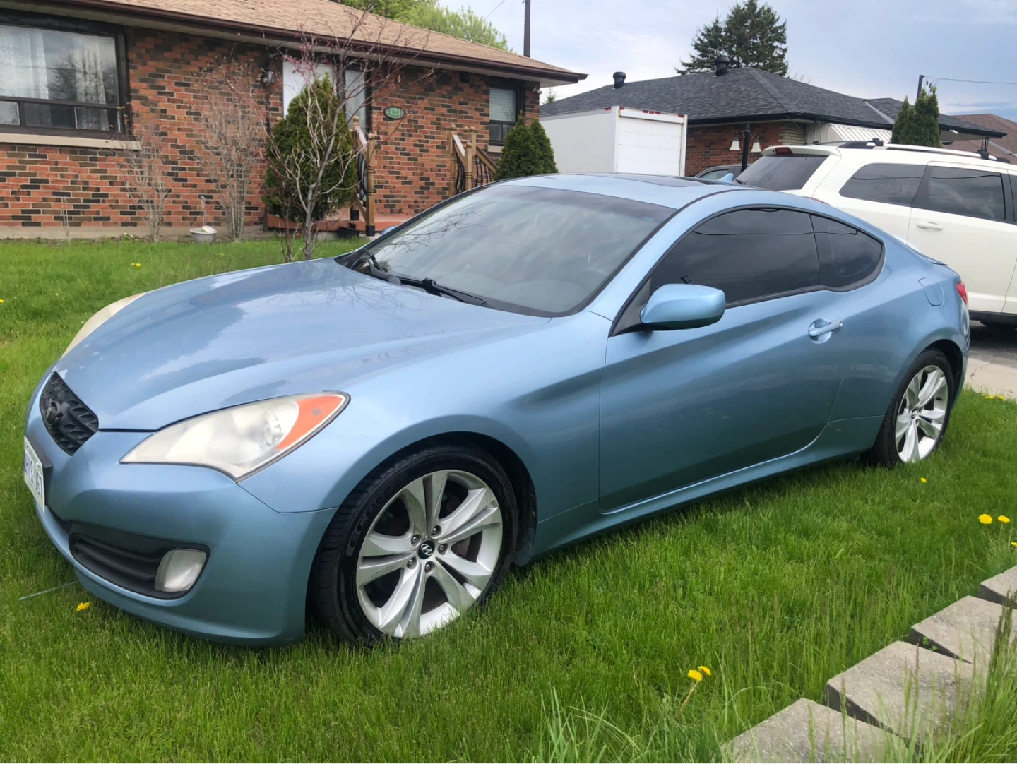 Hyundai Genesis Coupe 2.0T.  Only 232 kilometres