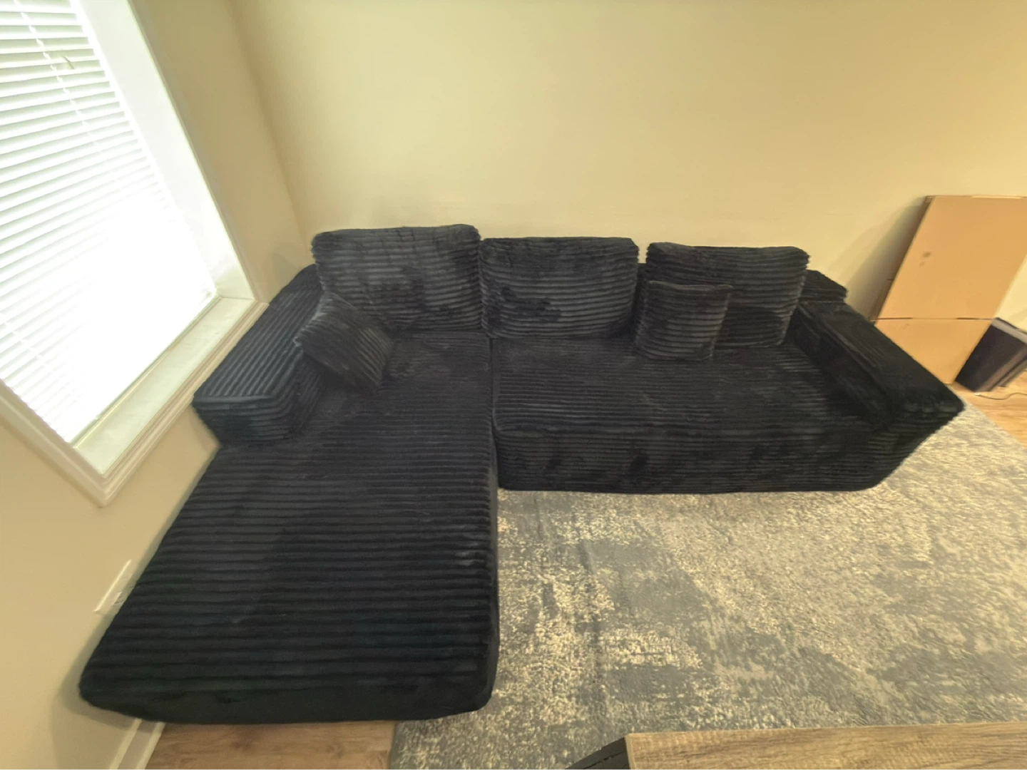 Black Sectional Couch with Striped Fabric - photo 3