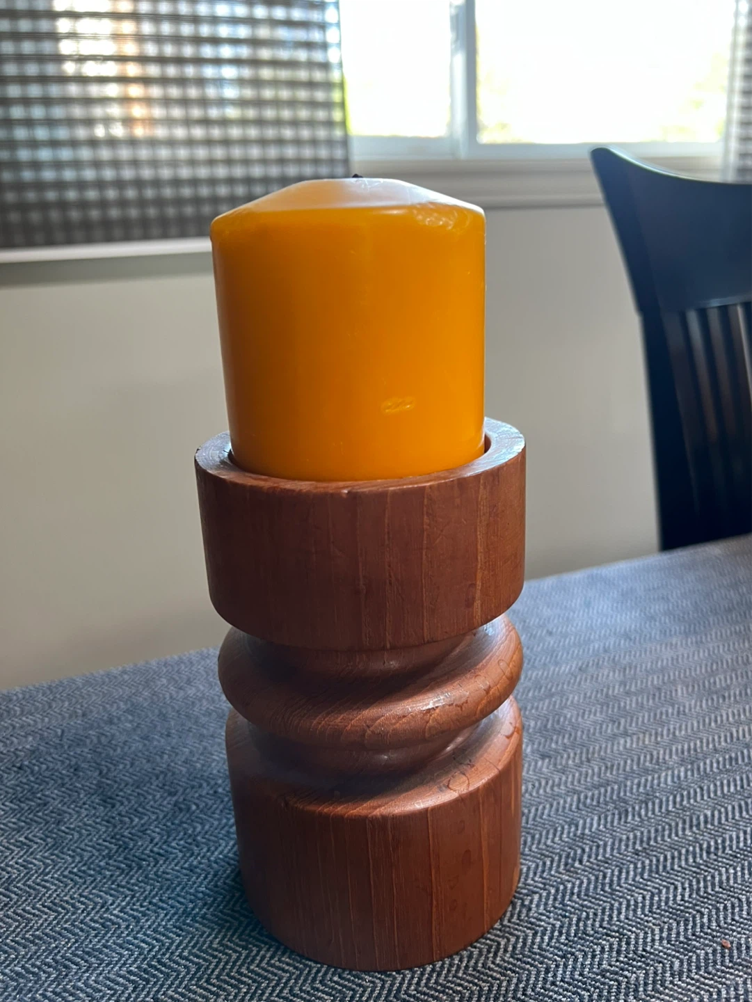 Wooden Candlestick Holder with Orange Candle