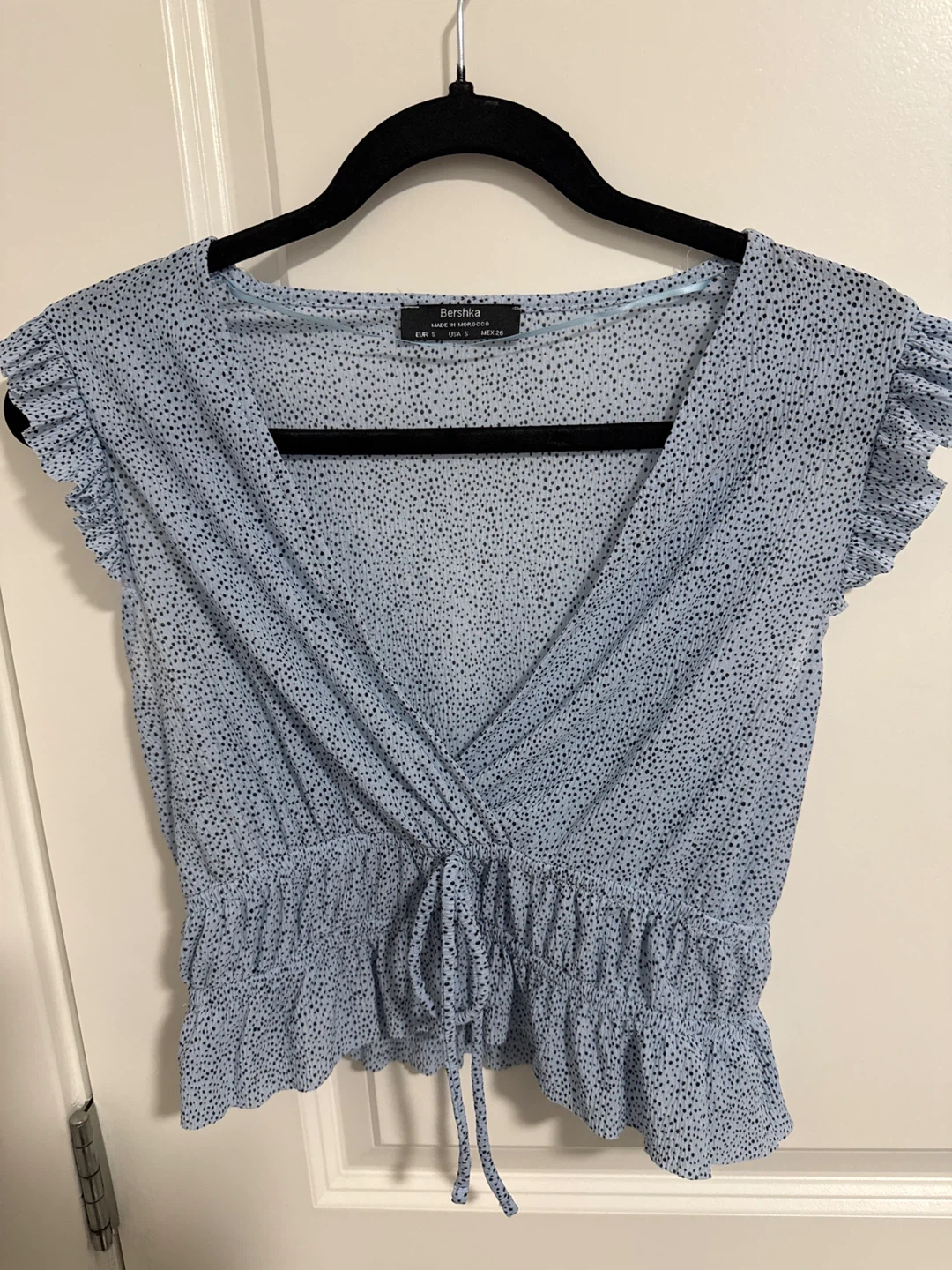 Small- Bershka light blue black dot pattern peplum top
