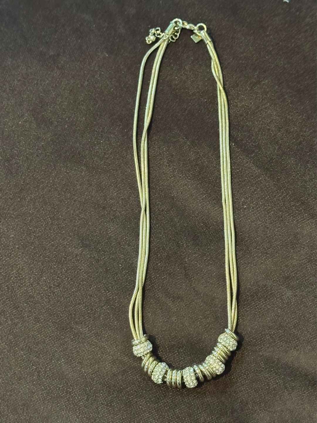Multi-strand necklace with rhinestone accents