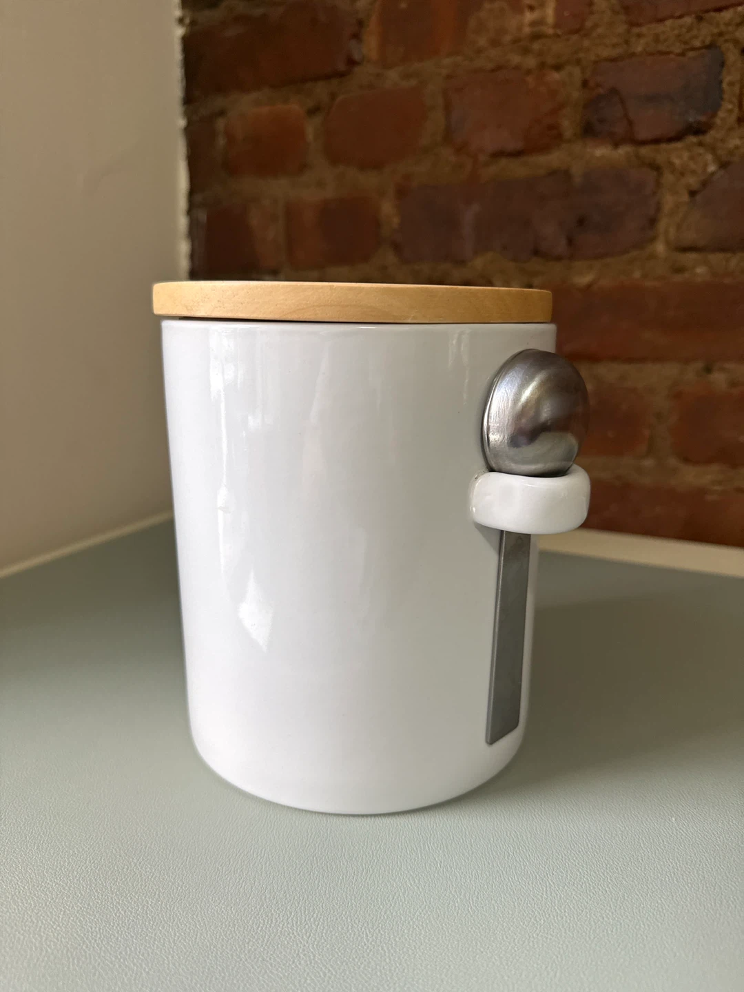 Crate & Barrel ceramic coffee grounds container