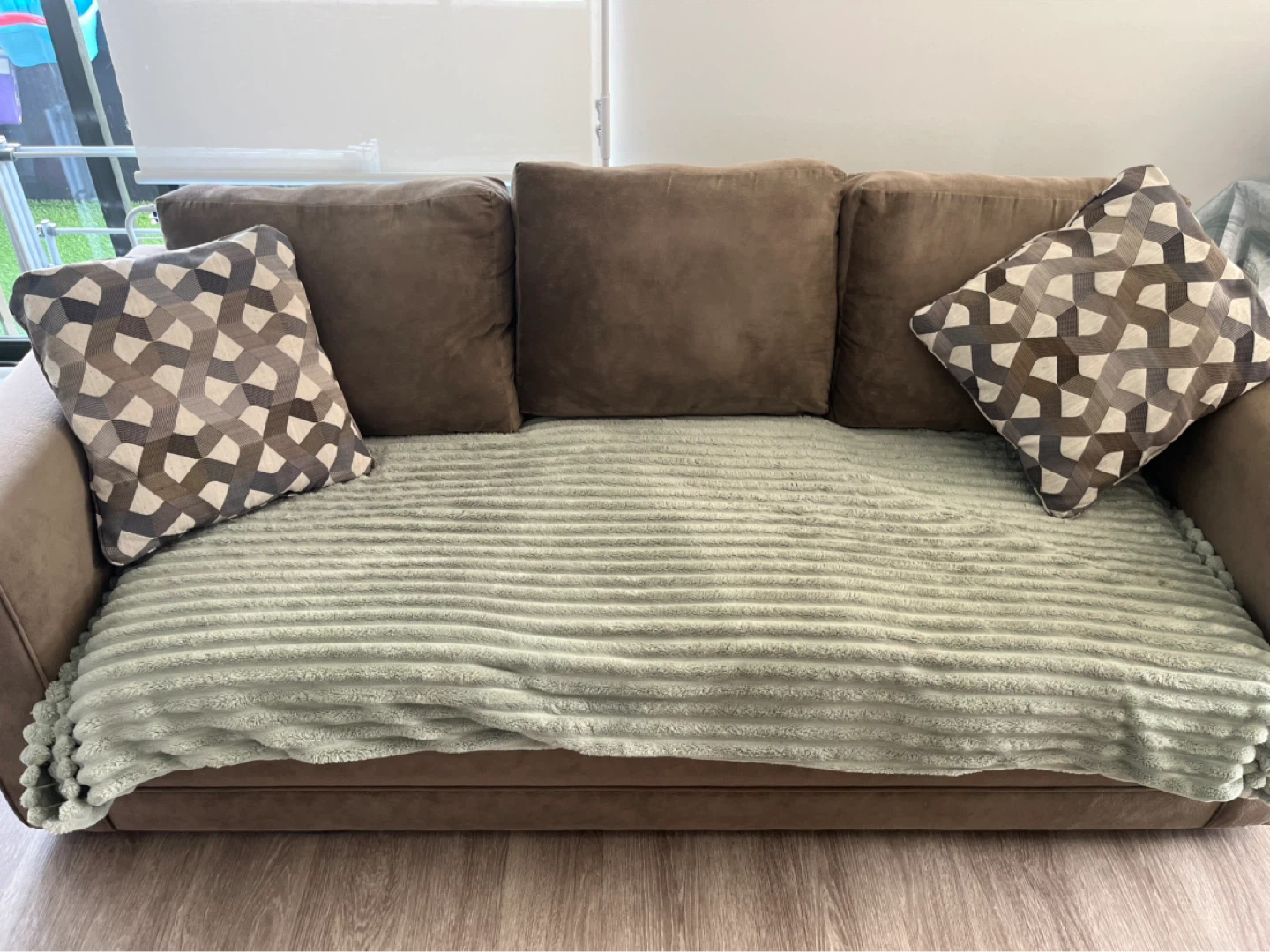 Brown 3 seater Sofa with Decorative Pillows and green throw - photo 2