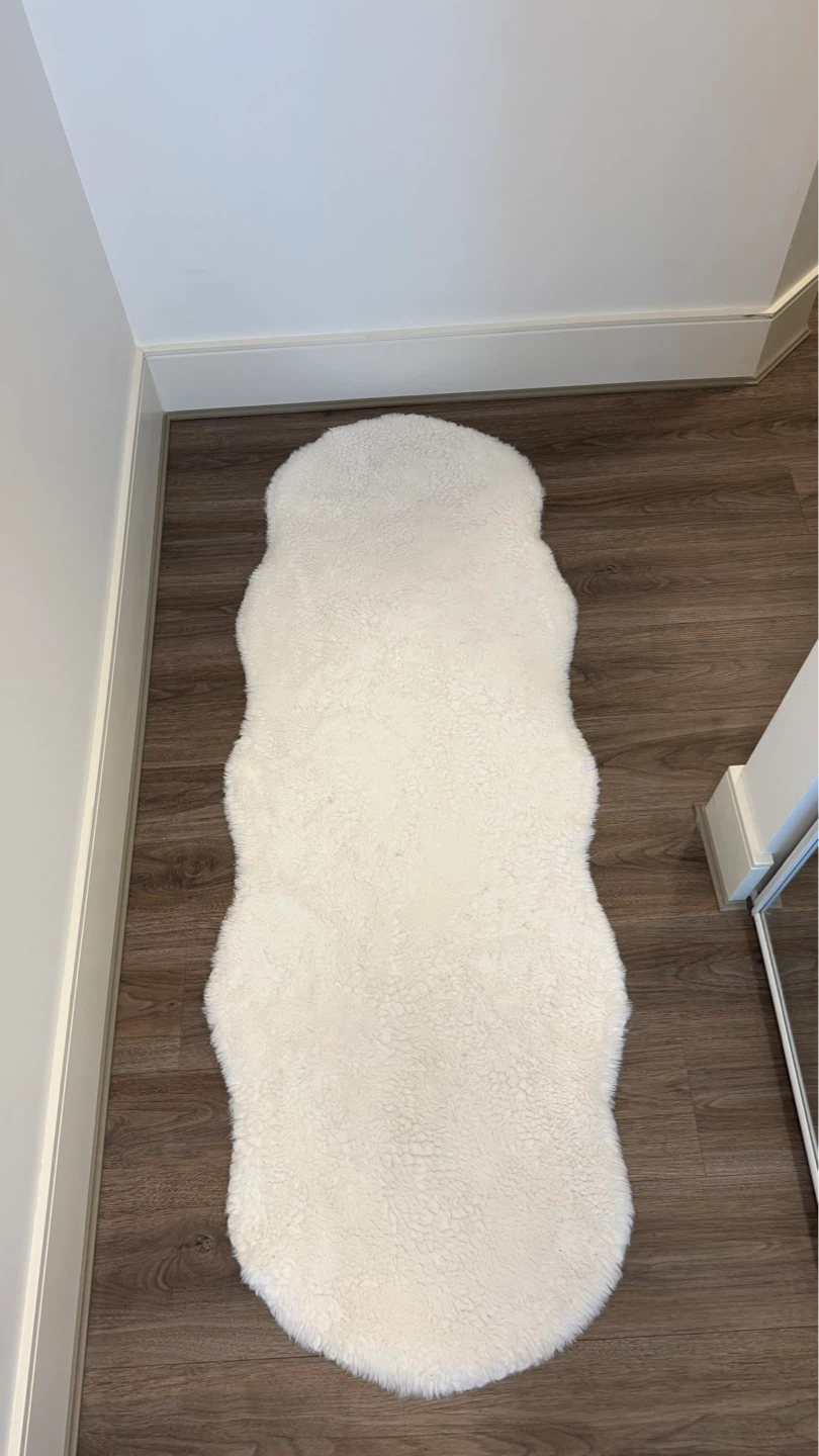 White faux fur runner. entry way rug. bedroom rug