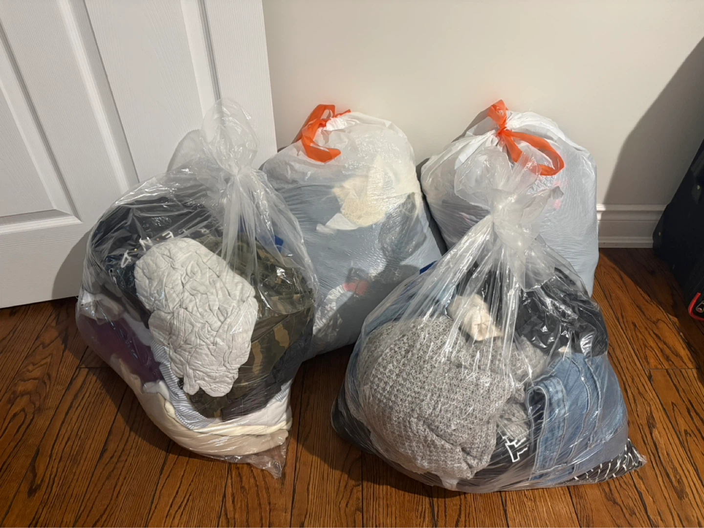 Assorted clothing (men’s & women’s) of varying sizes