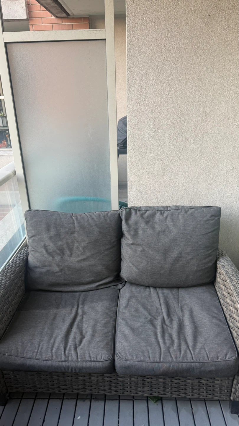 Wicker Loveseat with Grey Cushions