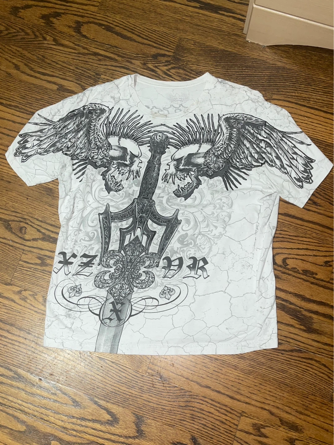 White T-Shirt with Skull and Sword Graphic